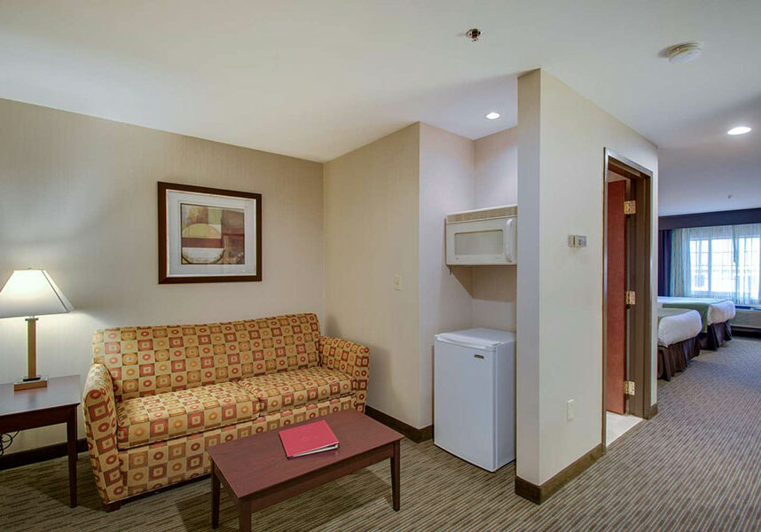 suite living area at Best Western Plus The Inn at Hampton